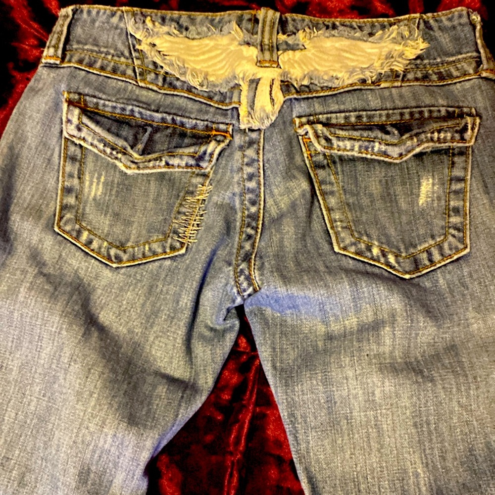 Heaven and Terra boot cut ripped jeans.